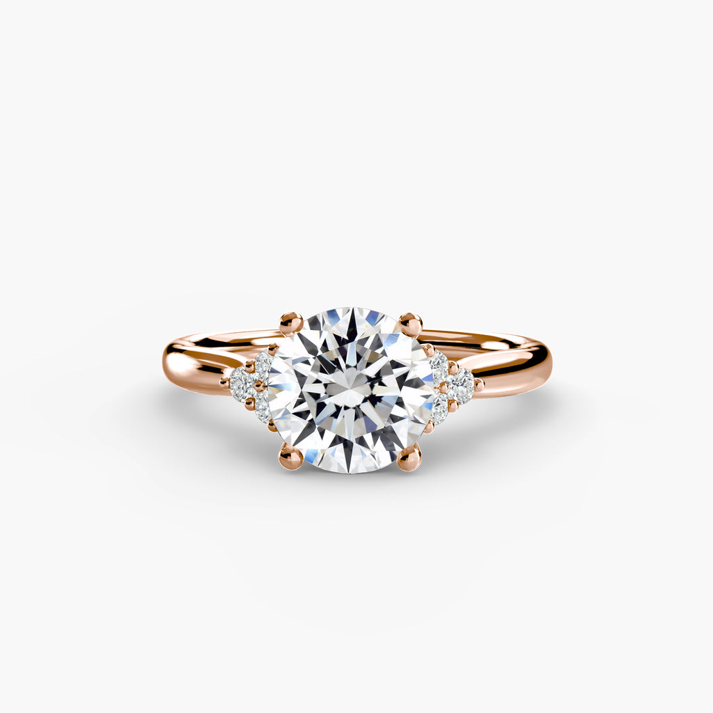 Emery Solitaire with Cluster Shoulders