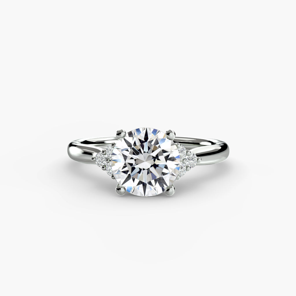 Emery Solitaire with Cluster Shoulders