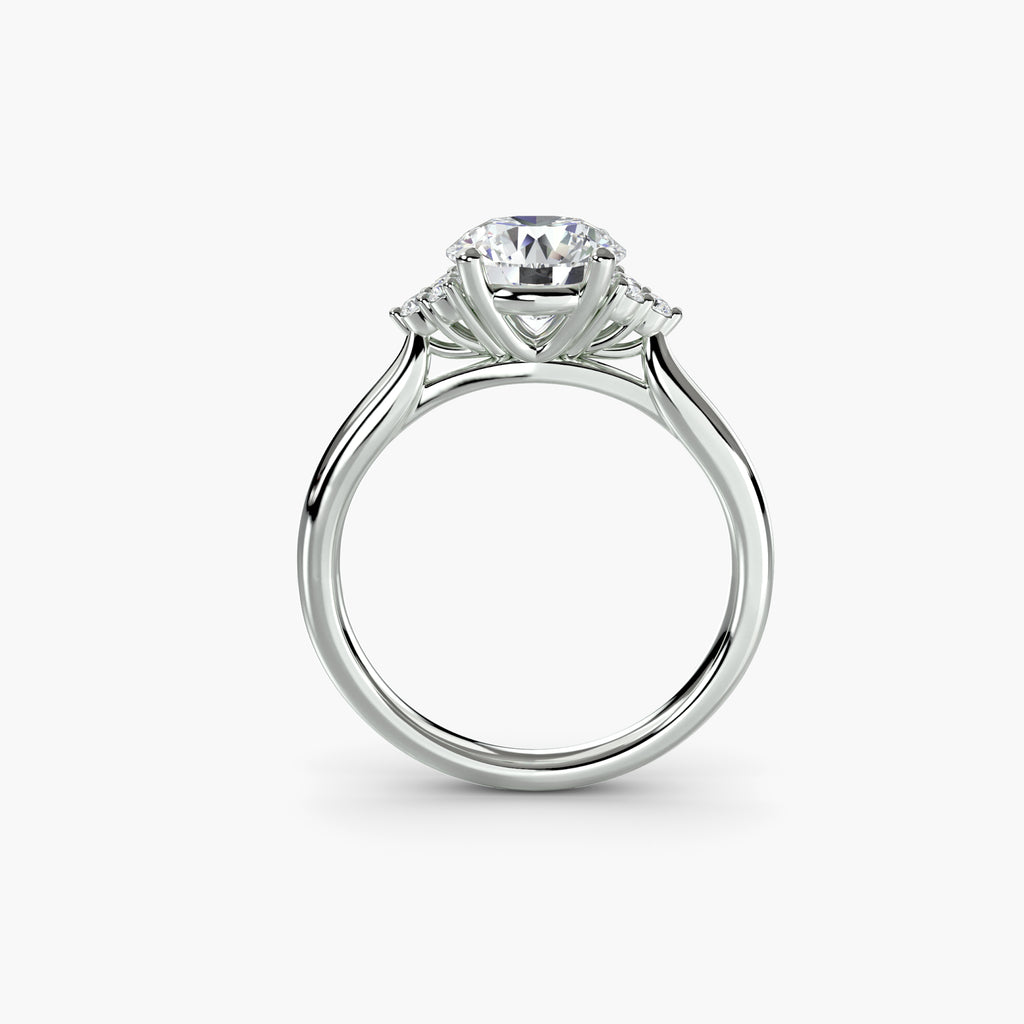 Emery Solitaire with Cluster Shoulders